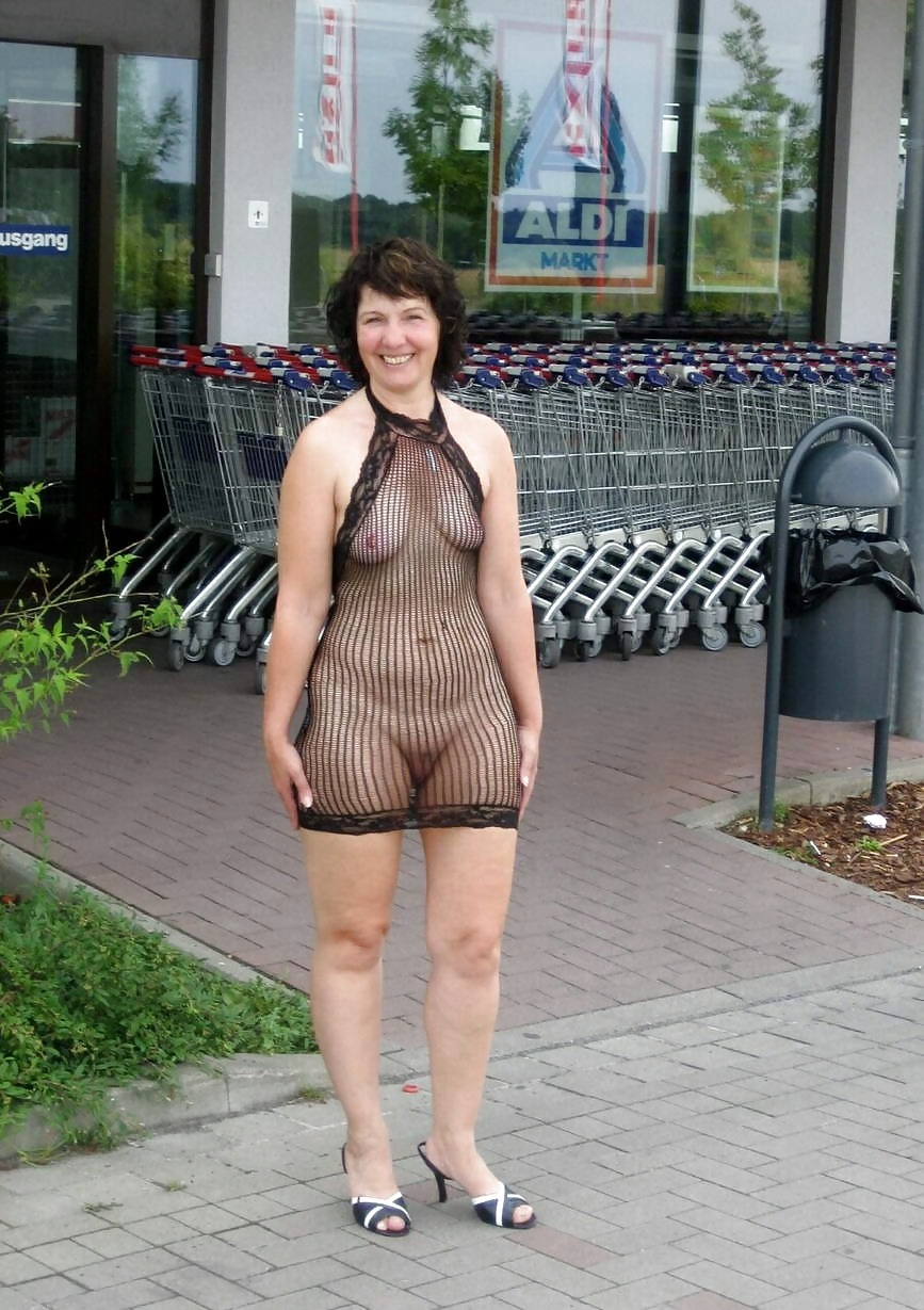 Mature in a transparent dress