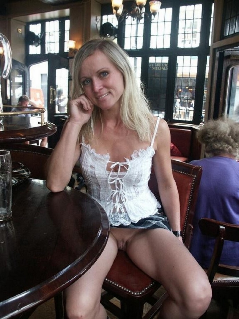 Women without panties in a cafe