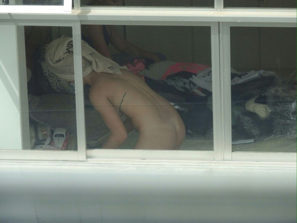 Peeping in the windows naked