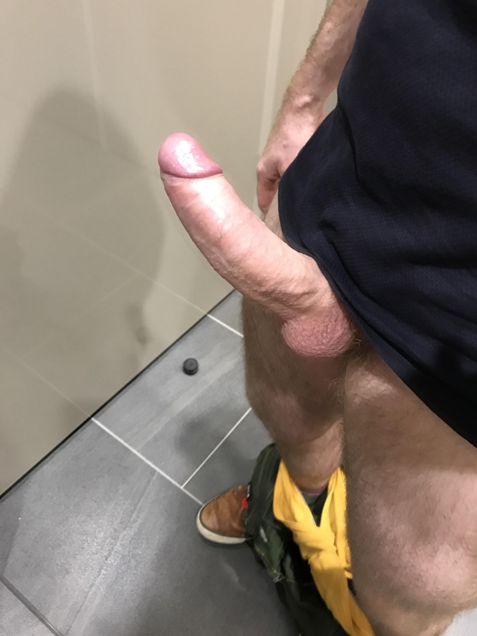 Jerking a member in a public toilet