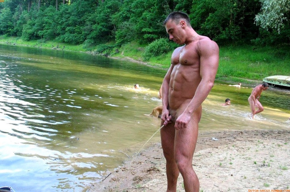 Naked guy on the river dick