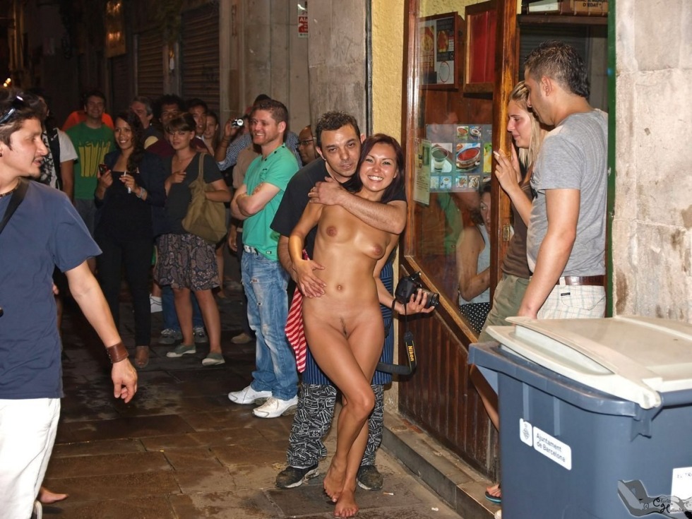 Naked woman among men