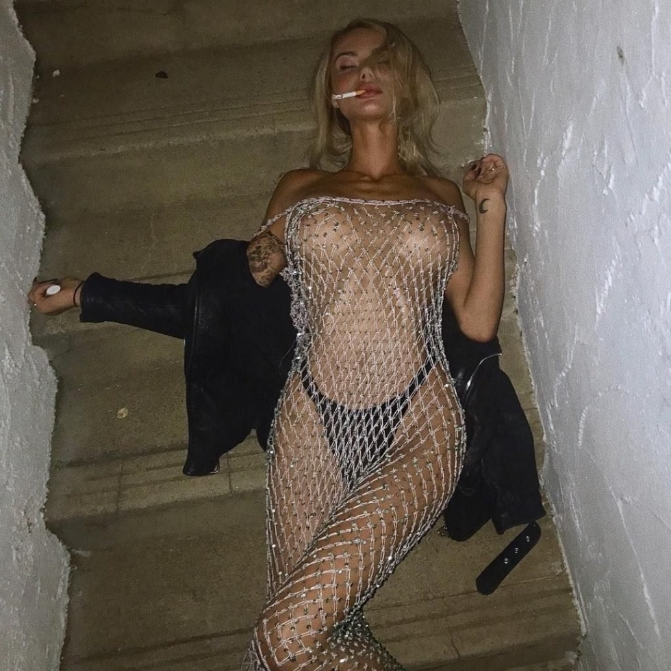 Exhibitionists in transparent dresses