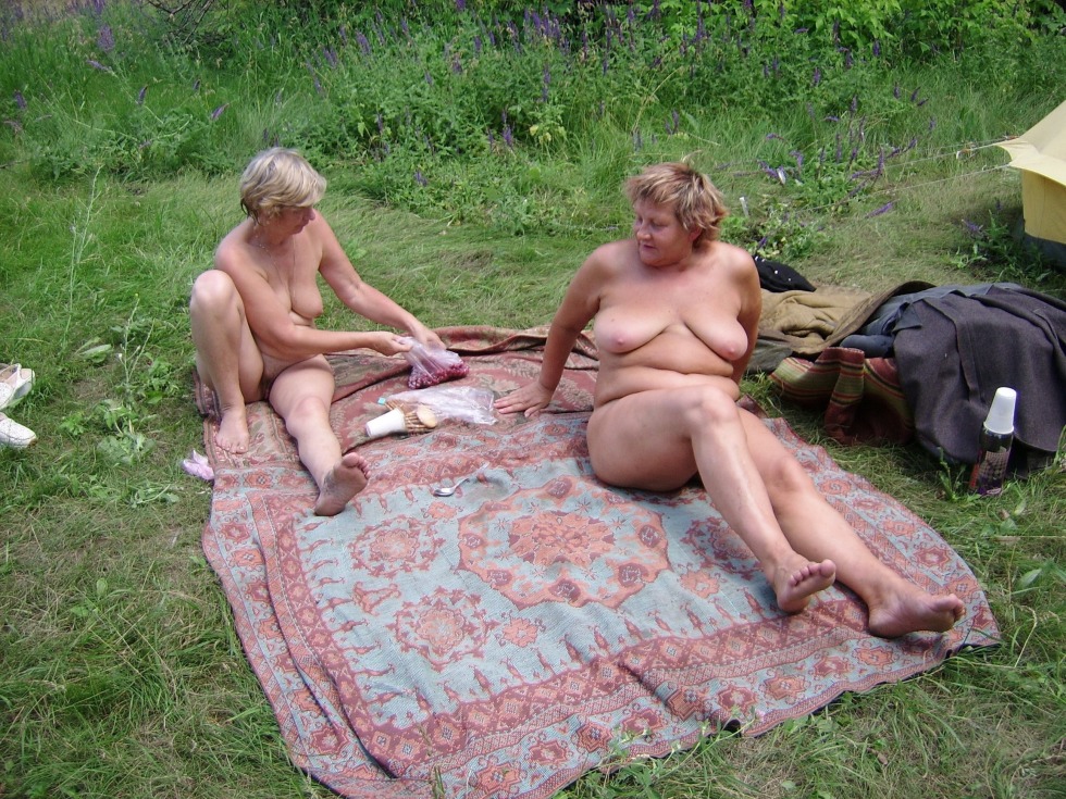 Mature nudists in nature