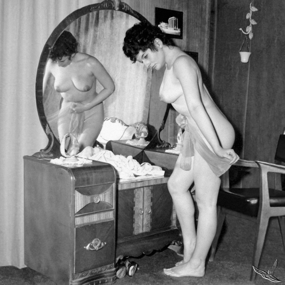 Naked women in a retro bathhouse