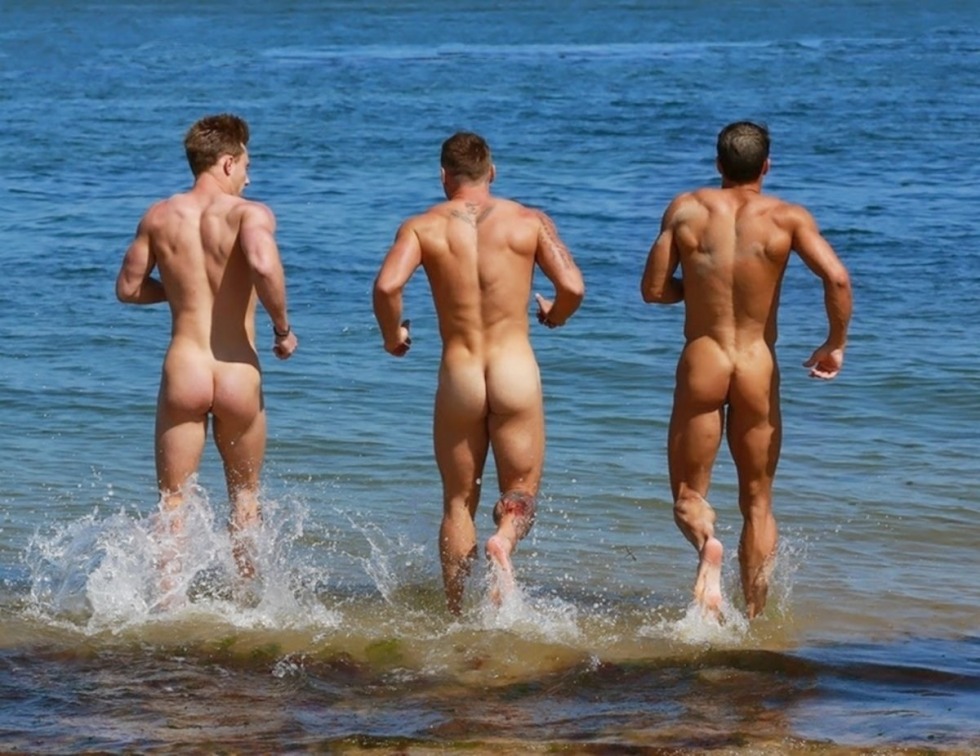 Naked young guys on the beach