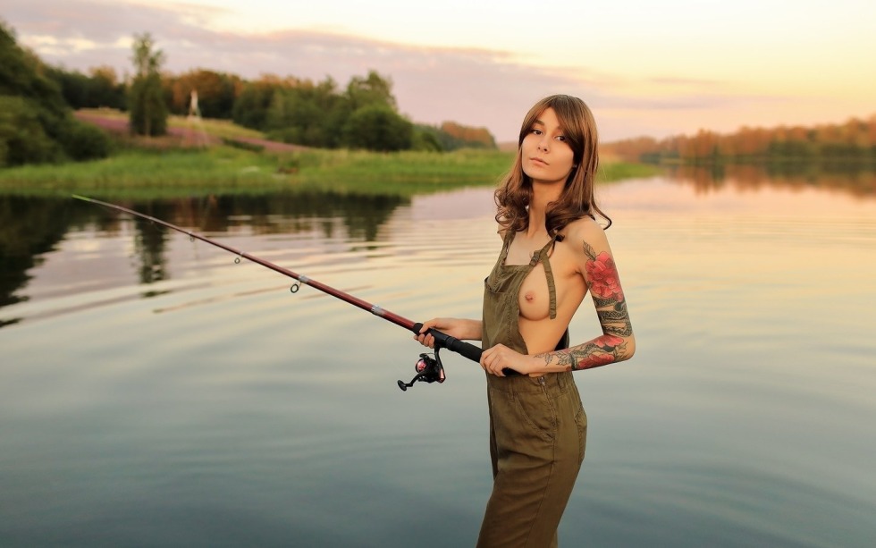 Girls topless fishing