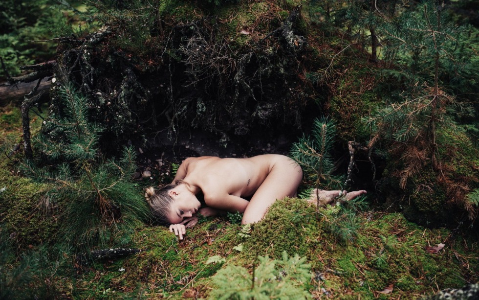 In the forest, a girl with a girl naked