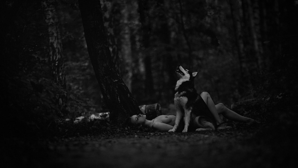 Photo shoot nude in a night forest