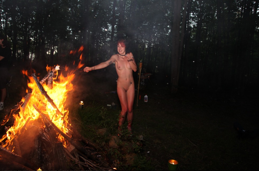 Undressed at night in the forest