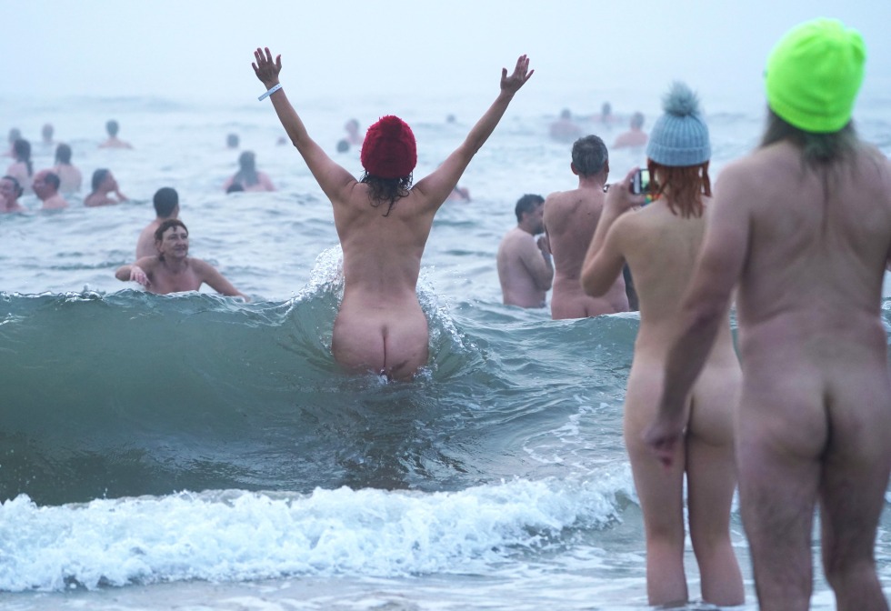 Swim in the sea with naked