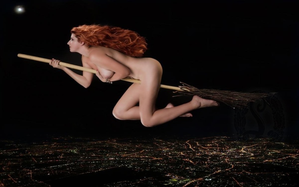Naked witch on a broomstick