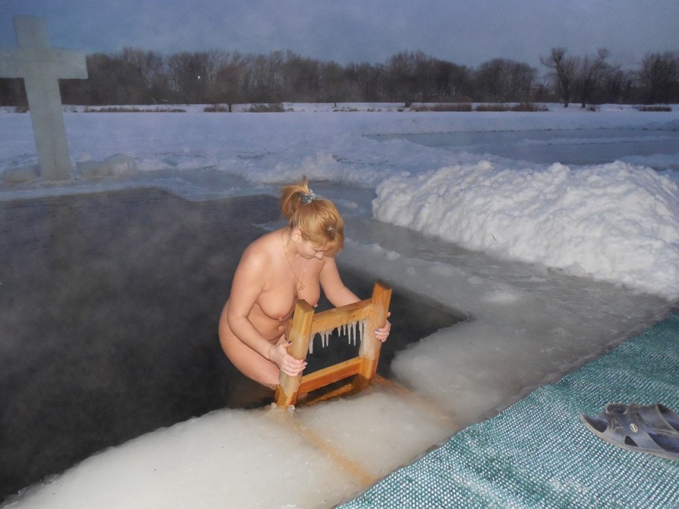 Family bathing naked in winter