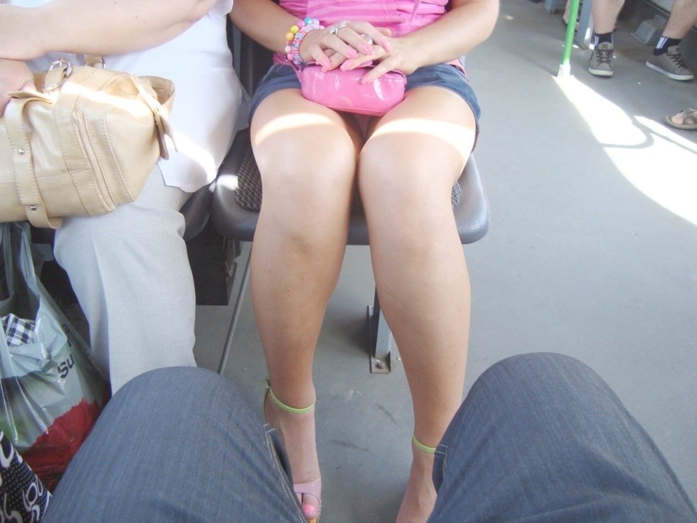 Peep under skirts in transport