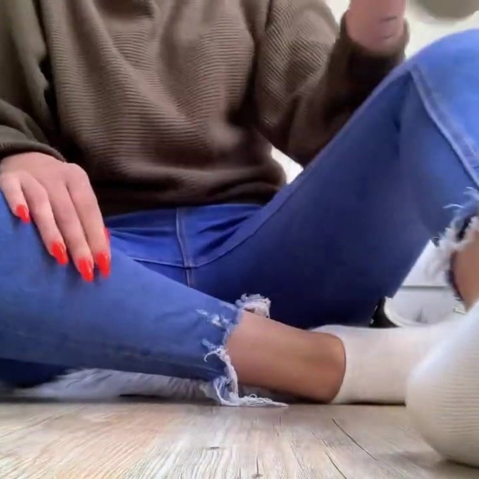 Jerking her legs in socks