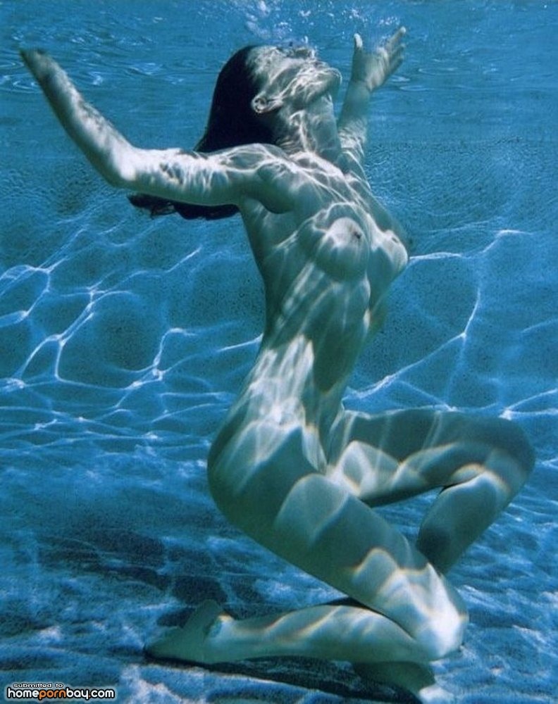 Naked in transparent water