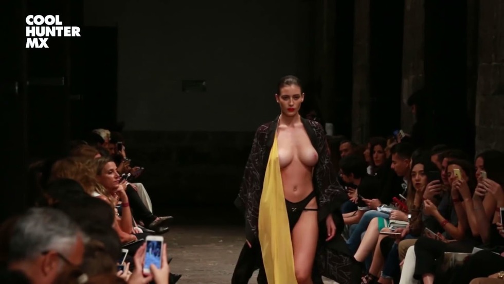 Fashion show with bare breasts