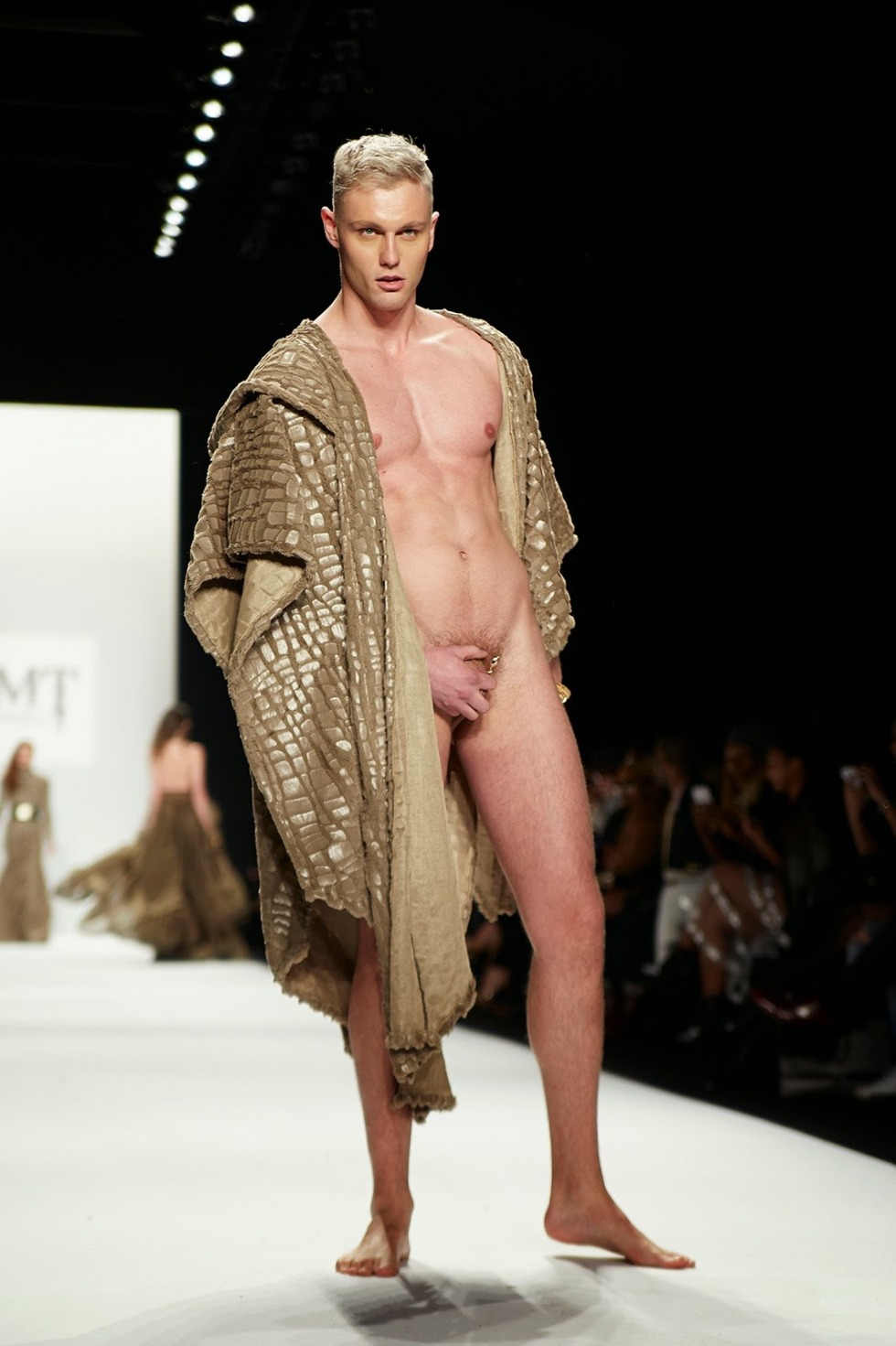 Naked men on the catwalk