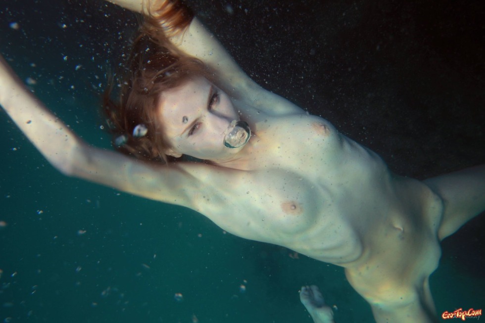 Underwater shooting of naked women