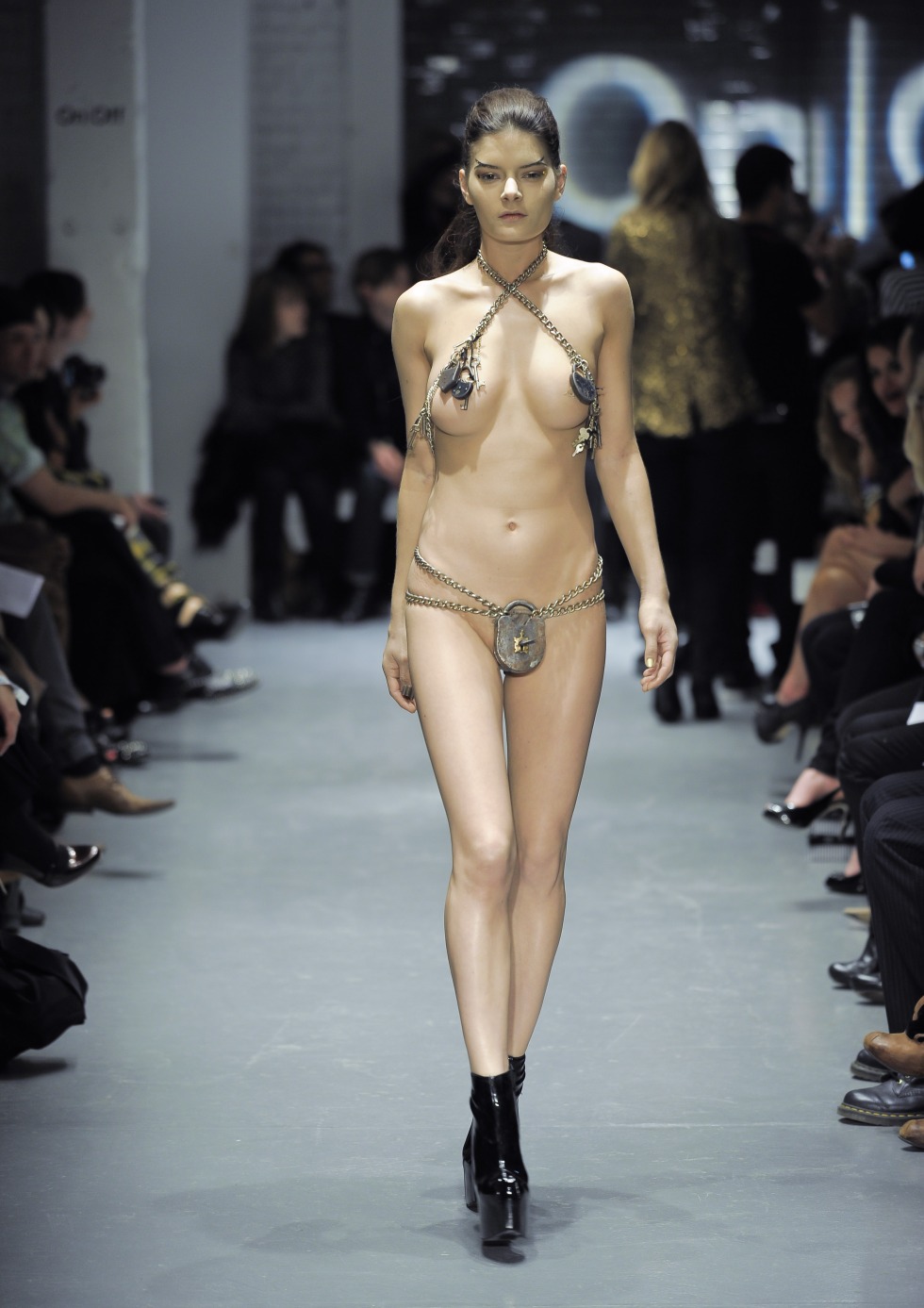 Naked fashion model on the catwalk