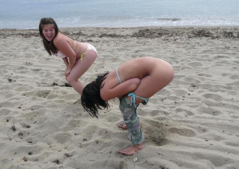 The girl wrote on the beach