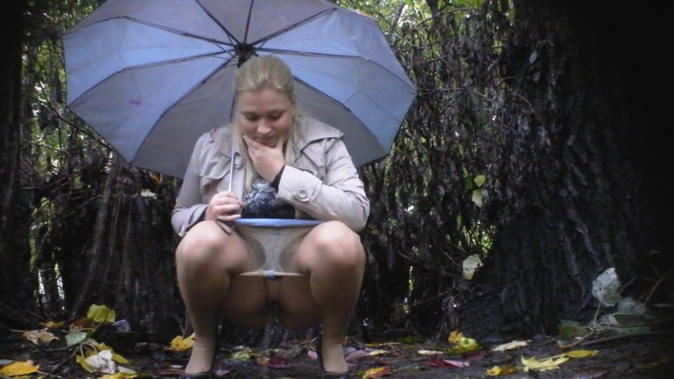 Pissing blonde in nature