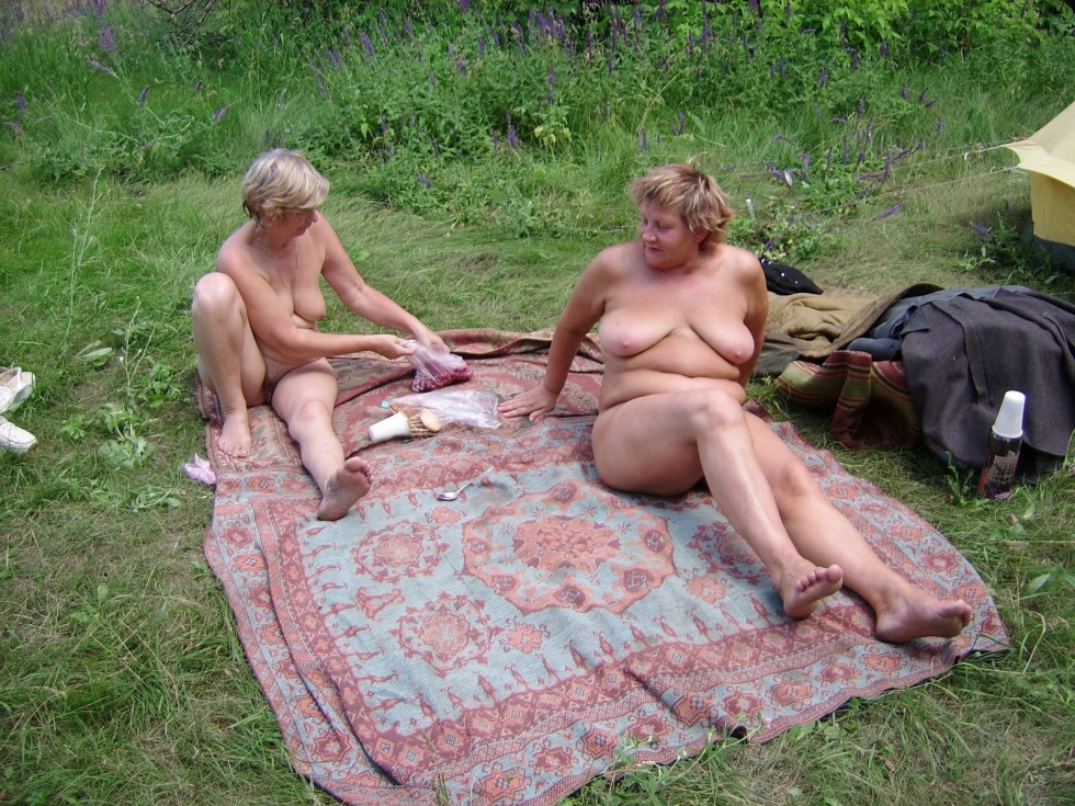 Mature nudists in nature