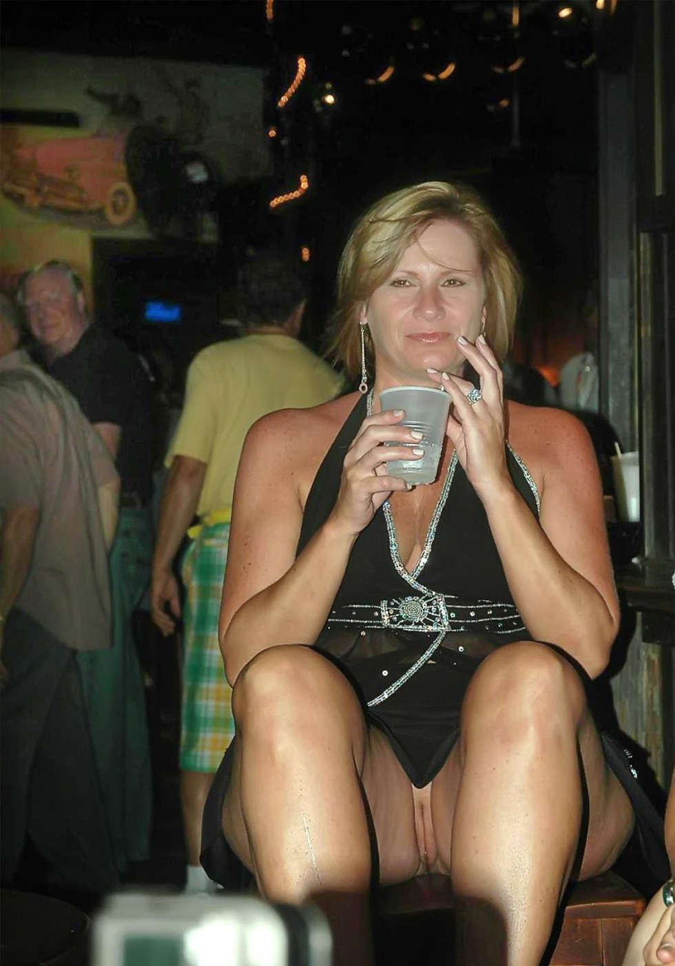 Mature at a party without panties