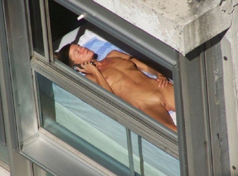 Naked women in windows peeping