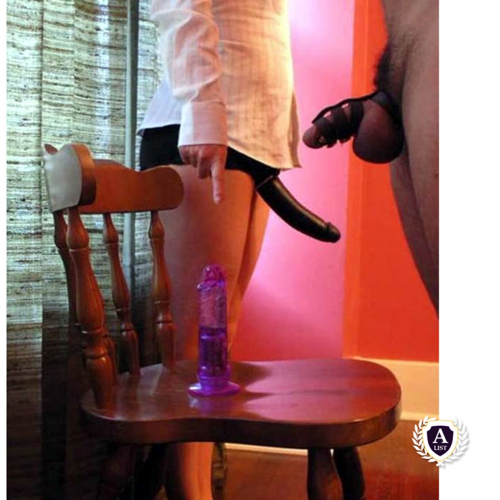 Phalloimitator sitting on a chair