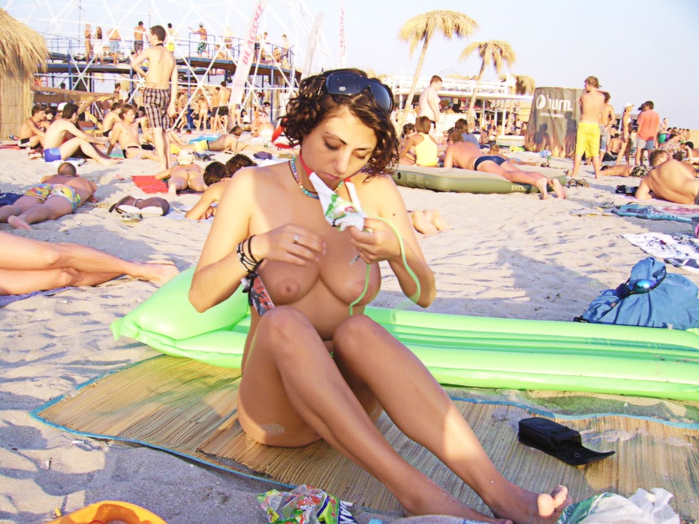 Busty on a public beach