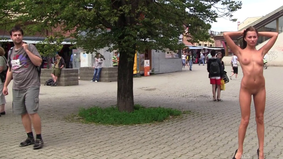 The girl undressed on the street on a dispute