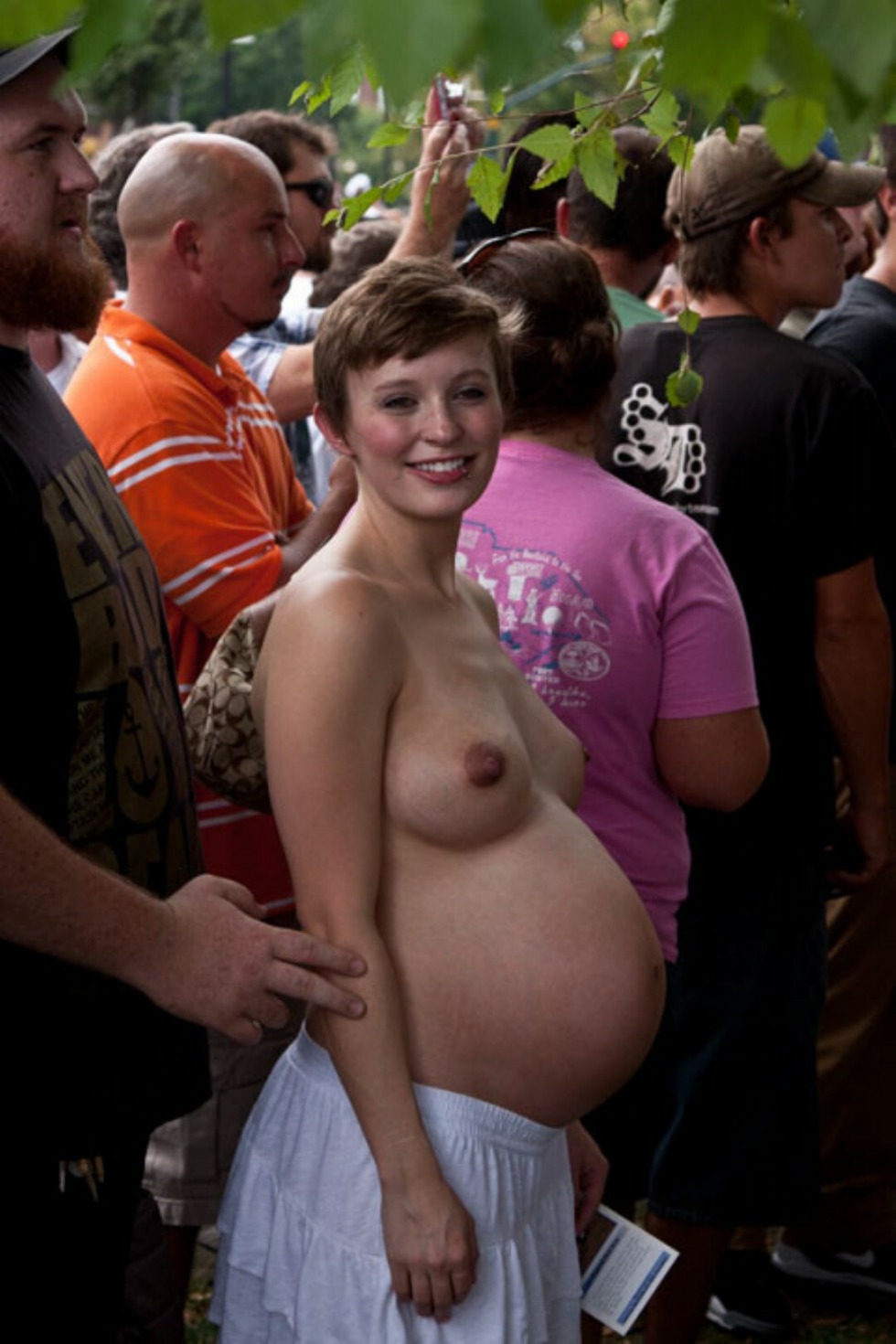 Naked pregnant women on the street