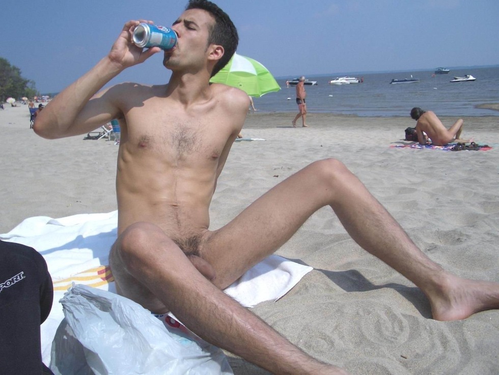 Naked guys without panties on the beach