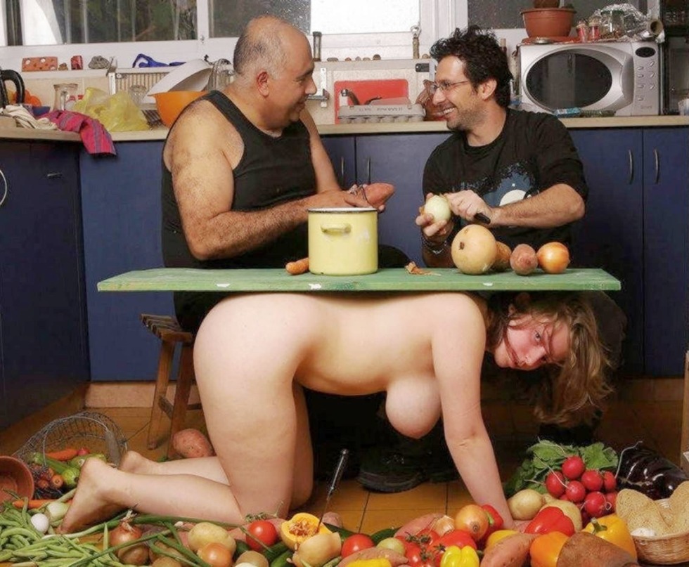 Naked woman on a table with food