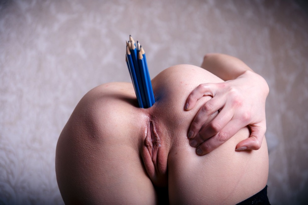 Anal masturbation with a pen