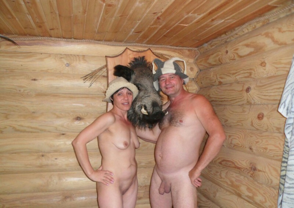 Naked women in a bathhouse with men