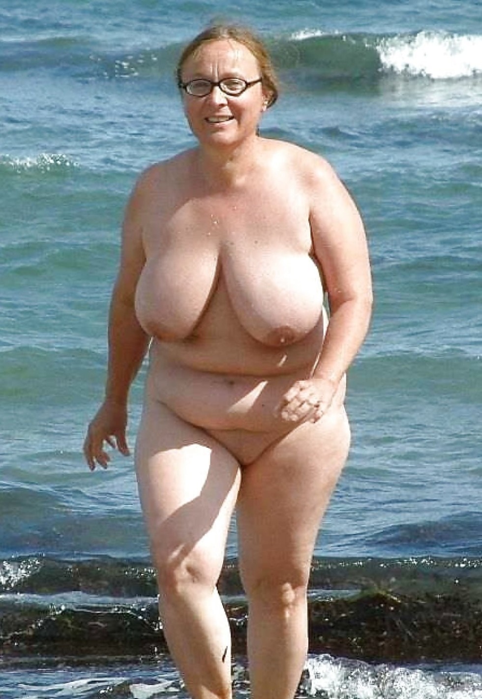 Huge boobs old women on the beach