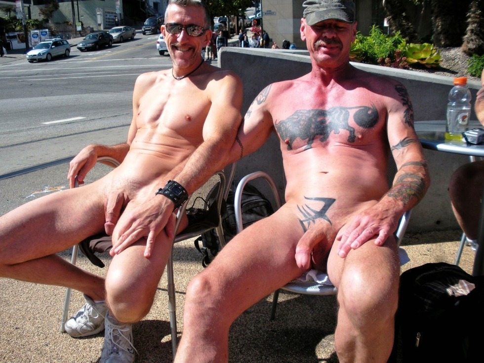 A man with a naked member in public