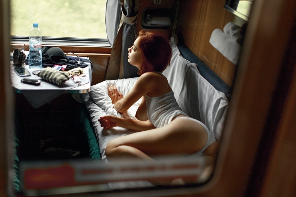 Margo Robbie in a reserved seat car