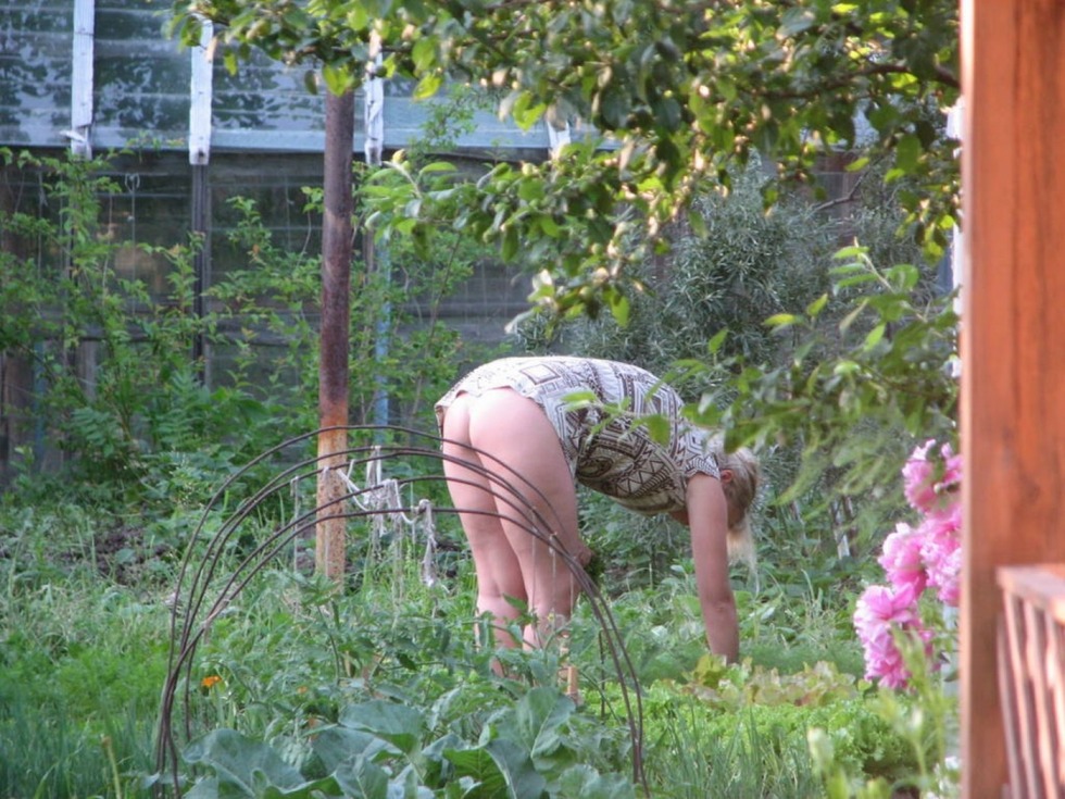 Woman in shorts in the garden