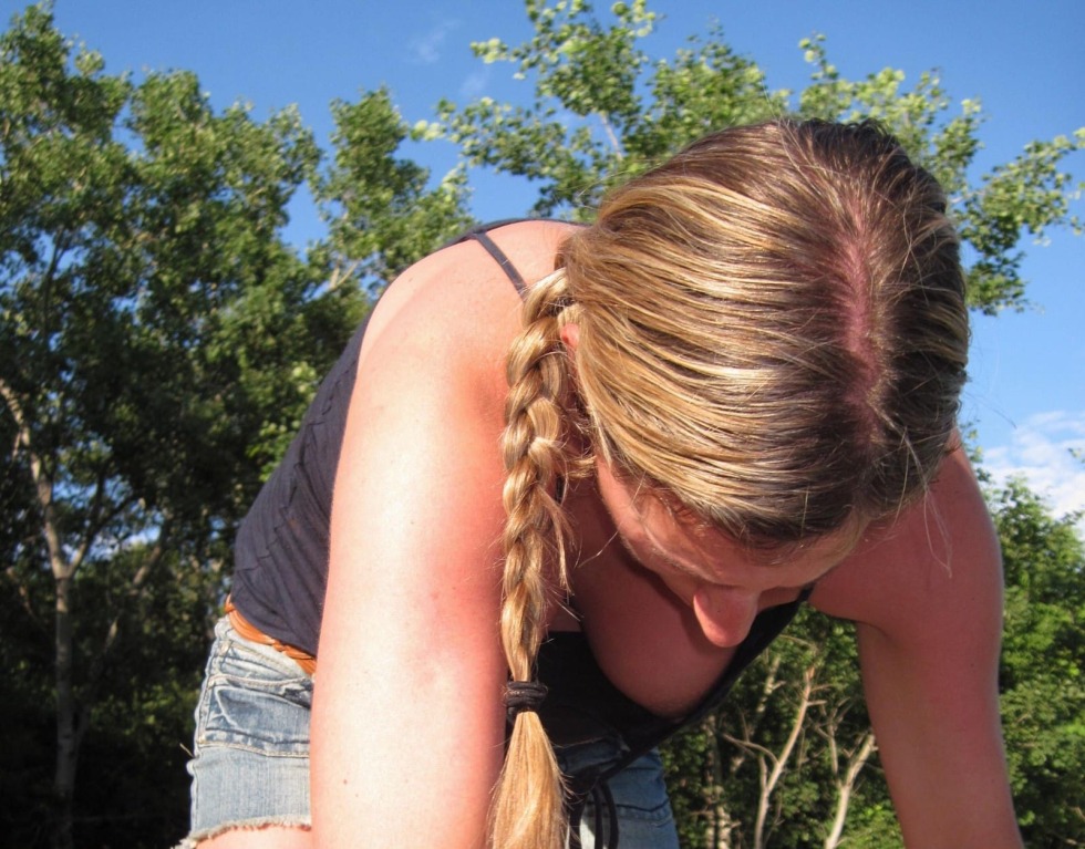 Bent down and lit her chest