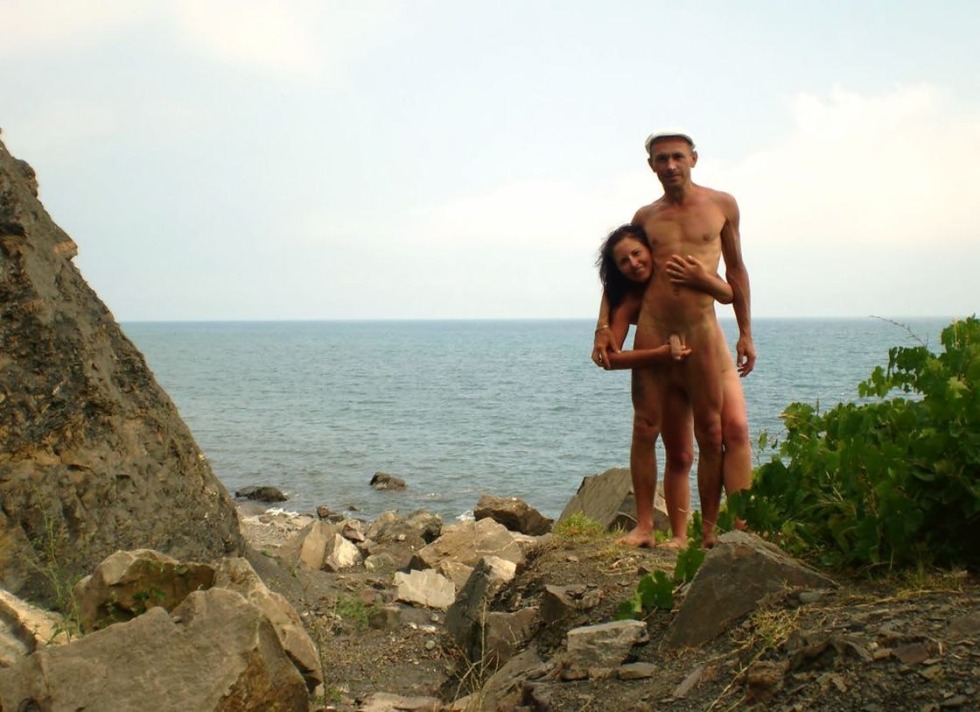 Naked men on the beach in Crimea