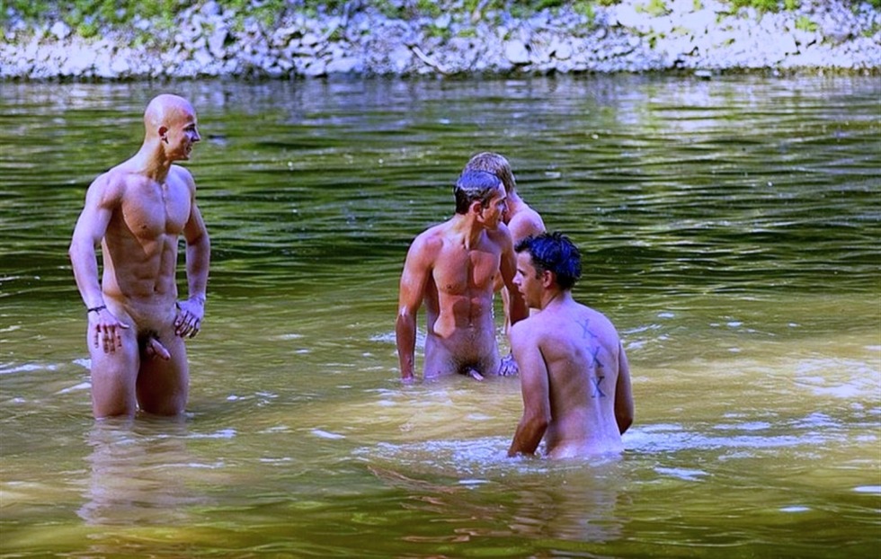 Naked guys bathing in the river