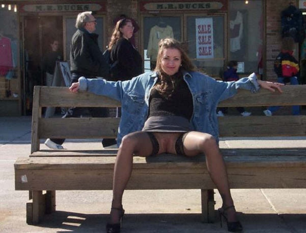 Sits on a bench without panties