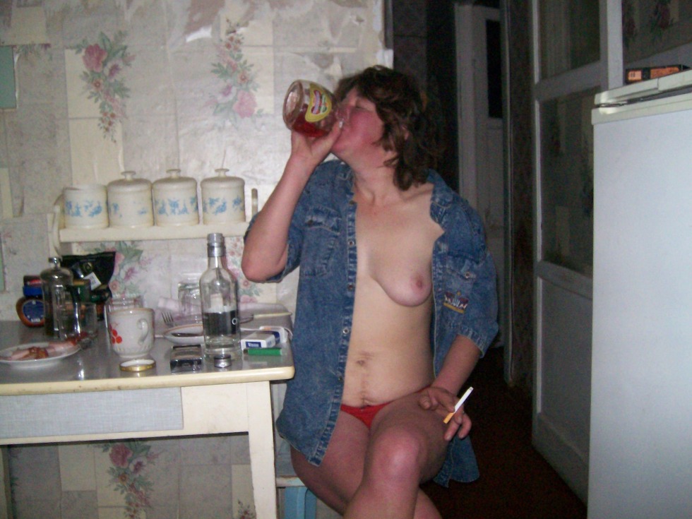 Drunk nude women in the kitchen