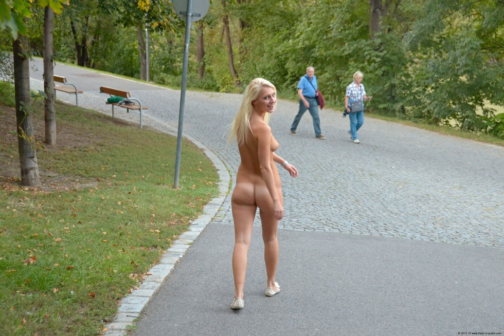Naked women walk on the street