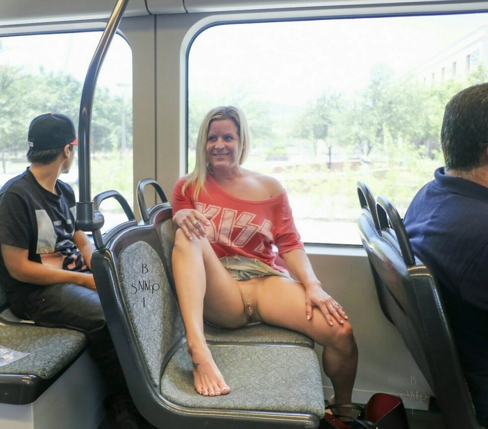 Under the skirt naked on the bus