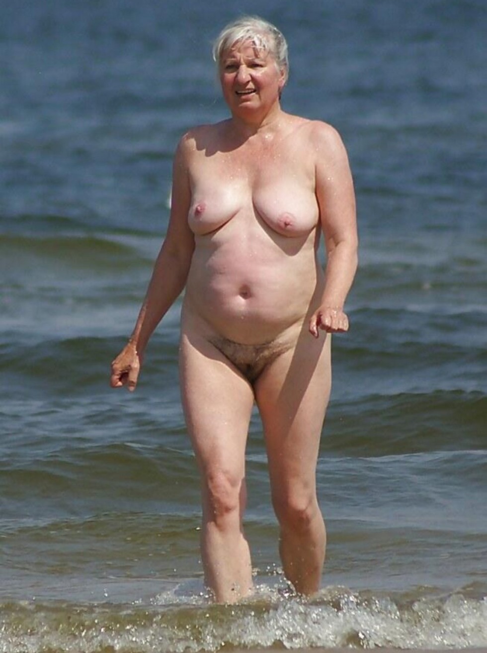 Elderly women on the beach without panties