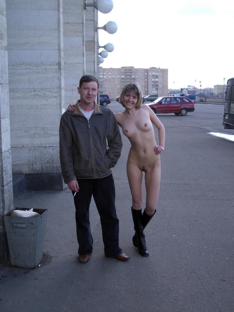 Men undress on the street